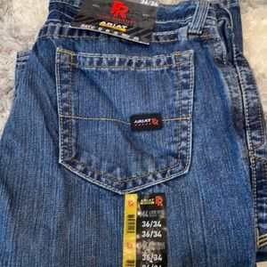 Ariat M4 FR jeans.  Medium blue, low rise and boot cut. 36/34 NEW W/ TAGS